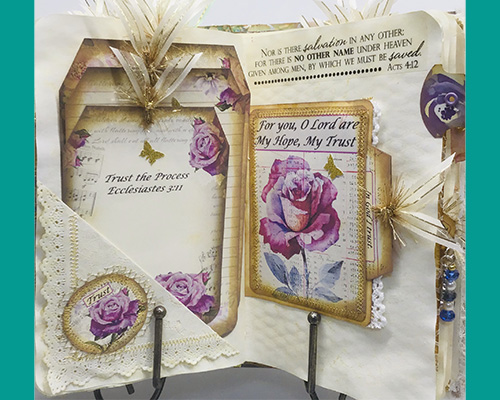 Memory book with decorative flowers and text..